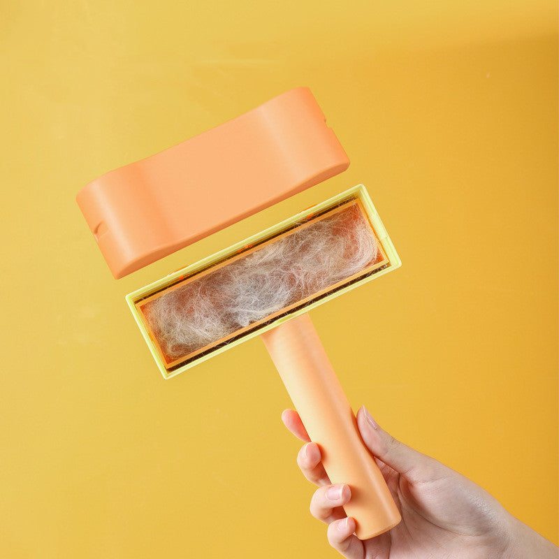 Furly Fur Roller in Orange colorway with cat-face design